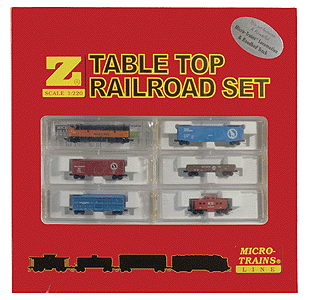 Desk Top Diesel Freight w/Magne-Matic Couplers & New Micro-Track -- Milwaukee Road (17"x 20" Oval , F7 Loco, 4 Cars & MOW Caboose