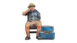 Man on a Folding Chair with Ice Chest