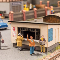 On the Platform -- 6 Figures & Ticket Window