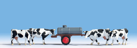 Cows at a Water Trough -- With Trailer