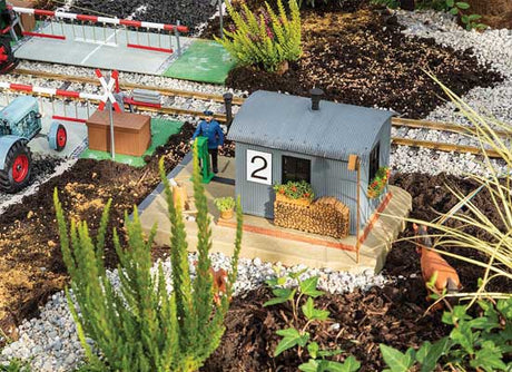 Gatekeeper's Stall with Moving Figure -- Kit - 11-13/16 x 7-13/16 x 6-13/16" 30 x 19.8 x 17.3cm