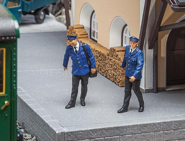 2 Train Attendants -- Blue Uniforms