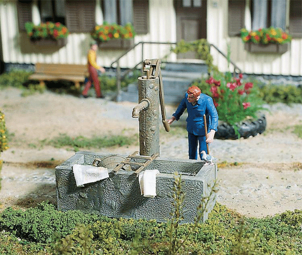 Well -- Includes Hand Pump & Trough