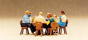 Pedestrians -- Family Sitting in Garden