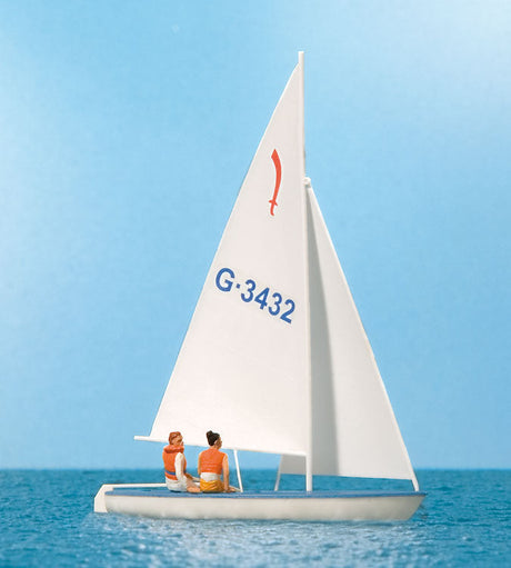 Korsar Sailboat w/Sailor -- Sails Up (white, red, blue)