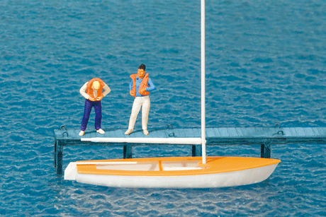 Korsar Sailboat w/2 Sailors Putting On Life Jackets -- Sails Down (white, yellow)