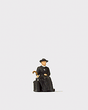 Reverend Waiting for Train