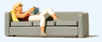 Recreation & Sports -- Woman Reading on Sofa