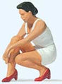 Woman Putting on Her Shoes Individual Figure