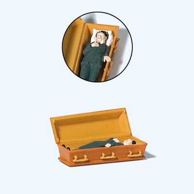Male Vampire Laying in Coffin