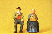 Elderly Farmer Seated w/Wife