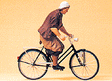 Pedestrian -- Woman On A Bicycle