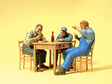 Sports & Recreation -- 3 Men Seated At Table Playing Cards