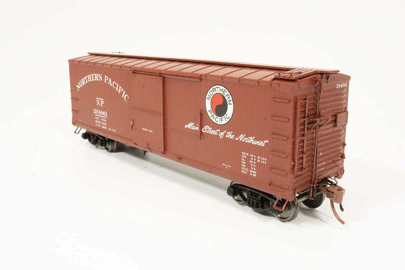 NP 10000-Series 40' Wood Boxcar 4-Pack - Ready To Run -- Northern Pacific (Company Service, Boxcar Red, Main Street Slogan, Large Mon-1