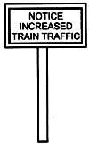 Signs -- "Notice Increased Train Traffic"