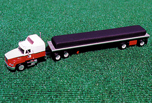American trucks - Tractor/Trailer - Mack 3-Axle Conventional w/Sleeper -- w/48' Spread Axle Flatbed Trailer & Tarped Load Royal Trucking