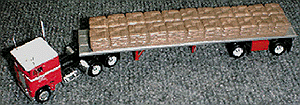 American Trucks - Tractor Trailer - White Freightl;iner 3-Axle Cabover -- w/48' Spread Axle Flatbed Trailer & Sack Load Joe Coelho