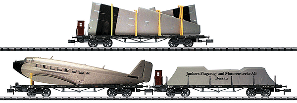 Minitrix Koln Flatcar 3-Pack w/Ju 52/3m Aircraft Load - Ready to Run -- German State Railroad DR (Era II, black w/silver Aircraft)