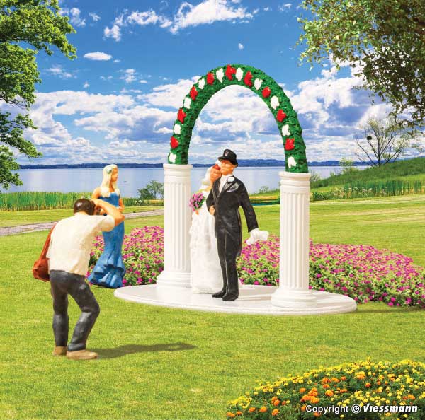 Bride and Groom with Wedding Arch-2