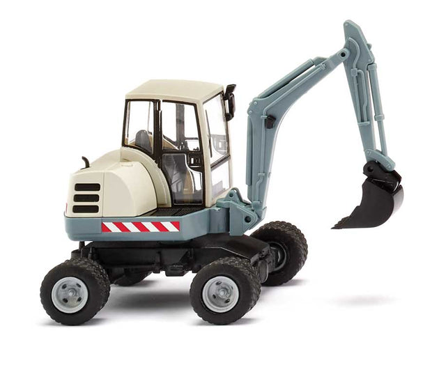Schaeff HR 18 Wheel Mini-Excavator with Shovel - Assembled -- Light Blue, White