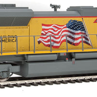 EMD SD70ACe - Standard DC -- Union Pacific(R) #8519 (Armour Yellow, gray; U.S. Flag, Building America Log