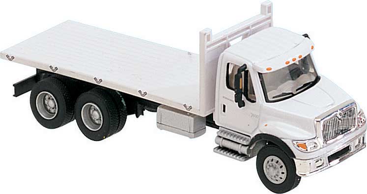 International(R) 7600 3-Axle Flatbed Truck - Assembled -- White with Railroad Maintenance-of-Way Logo Decals