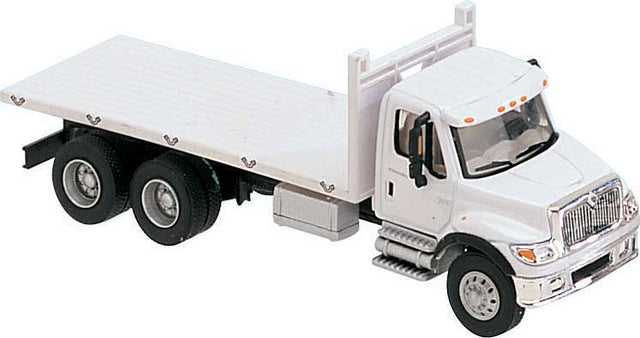 International(R) 7600 3-Axle Flatbed Truck - Assembled -- White with Railroad Maintenance-of-Way Logo Decals