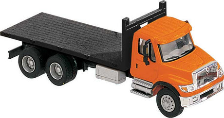 International(R) 7600 3-Axle Flatbed Truck - Assembled -- Orange Cab, Black Flatbed