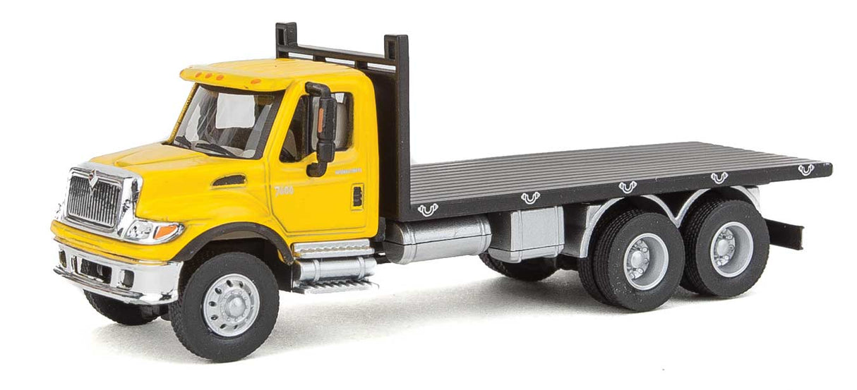 International(R) 7600 3-Axle Flatbed Truck - Assembled -- Yellow Cab, Black Flatbed-1