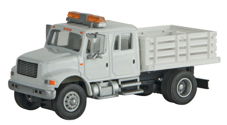 International(R) 4900 Open Stake Bed Utility Truck - Assembled -- White w/Railroad Maintenance-of-Way Logo Decals